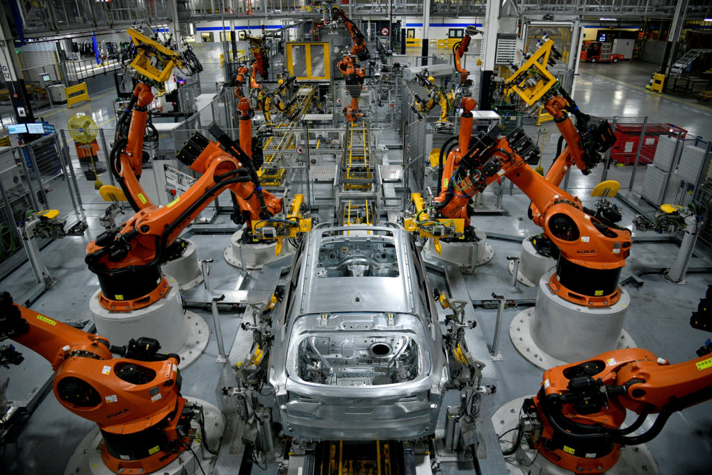 Autonomous robots assemble an X model SUV at the BMW manufacturing facility in Greer, South Carolina, U.S. November 4, 2019.  REUTERS/Charles Mostoller